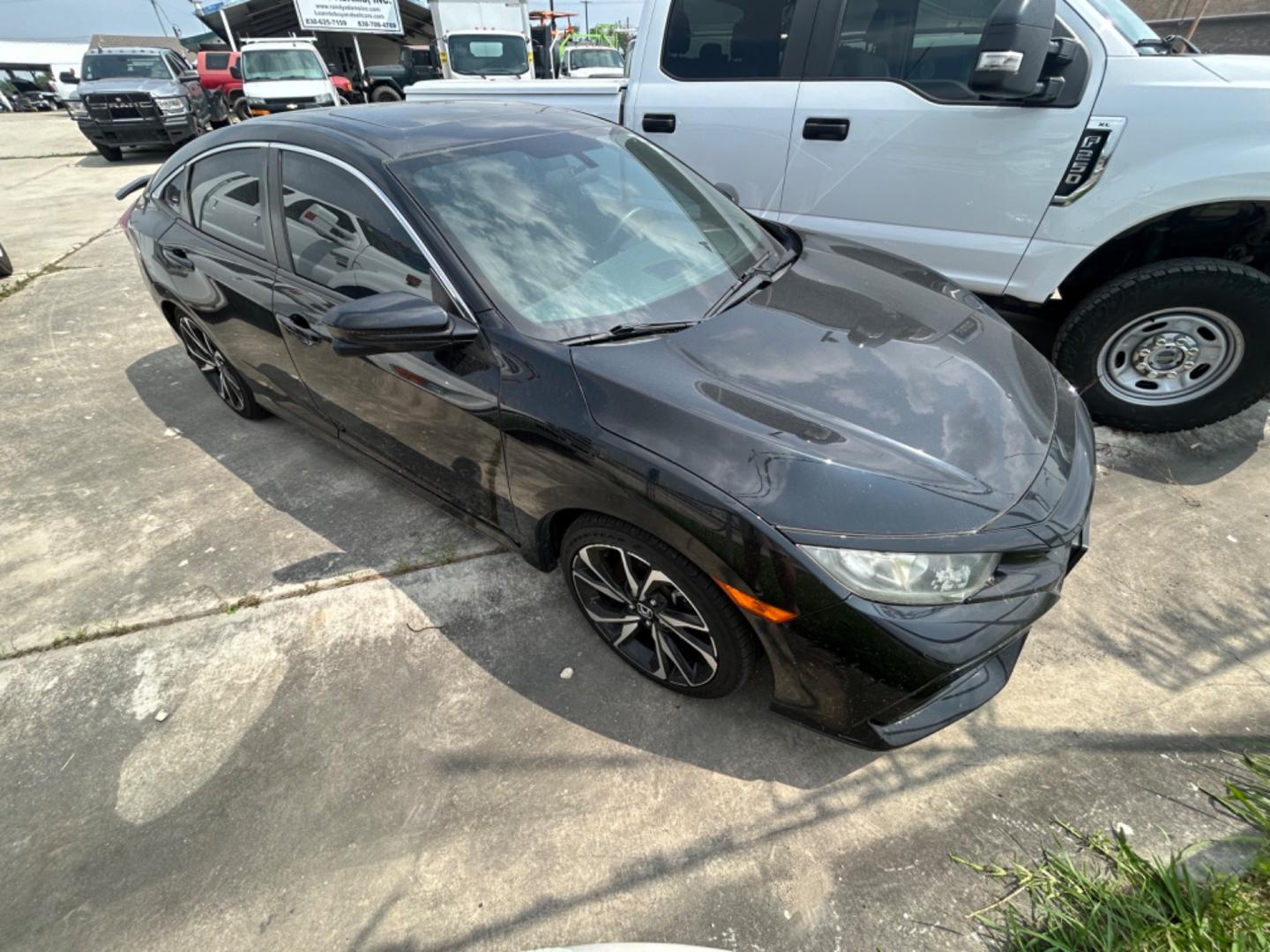 2017 Black Honda Civic Si 4dr Sedan 6M (2HGFC1E52HH) with an 1.5L L4 DOHC 16V TURBO engine, 6M transmission, located at 1687 Business 35 S, New Braunfels, TX, 78130, (830) 625-7159, 29.655487, -98.051491 - Photo#2